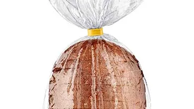 Sliced bread in a clear plastic bag, sealed with a yellow clip.