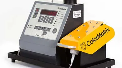 ColorMatrix CMG3000 industrial machine with a gray control panel and a bright yellow part displaying the ColorMatrix logo.