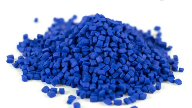 Three‑dimensional illustration of layered cylindrical rods forming a composite structure.